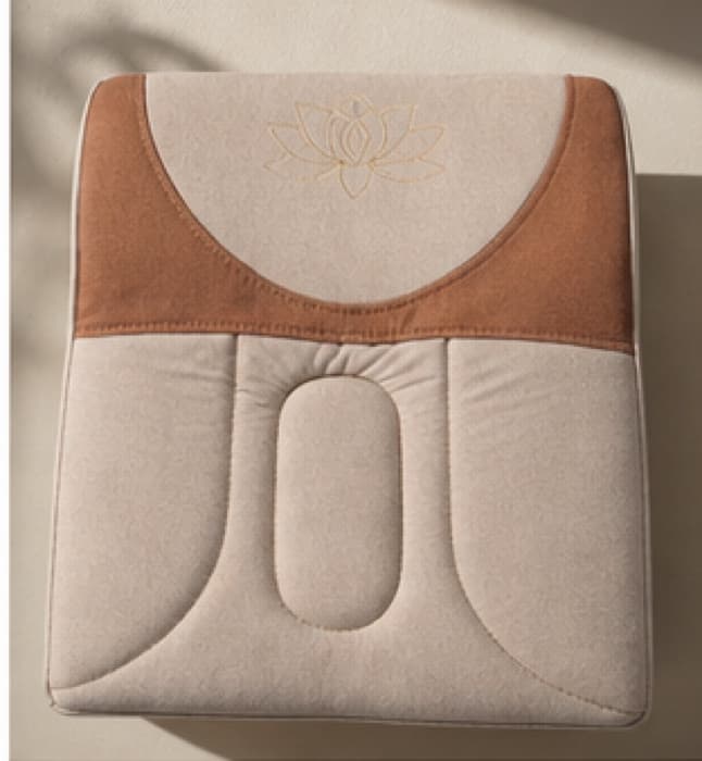 The woven cover from behind, with the lotus embroidered on the raised back